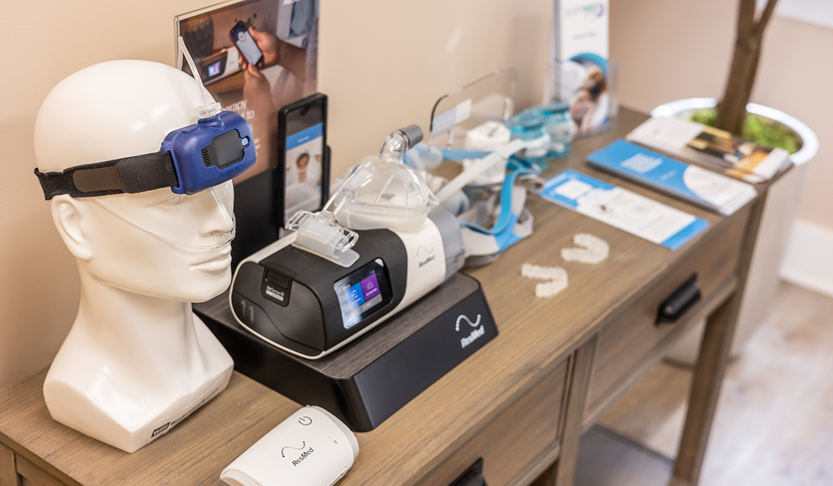 Desk with different models of C P A P masks on display