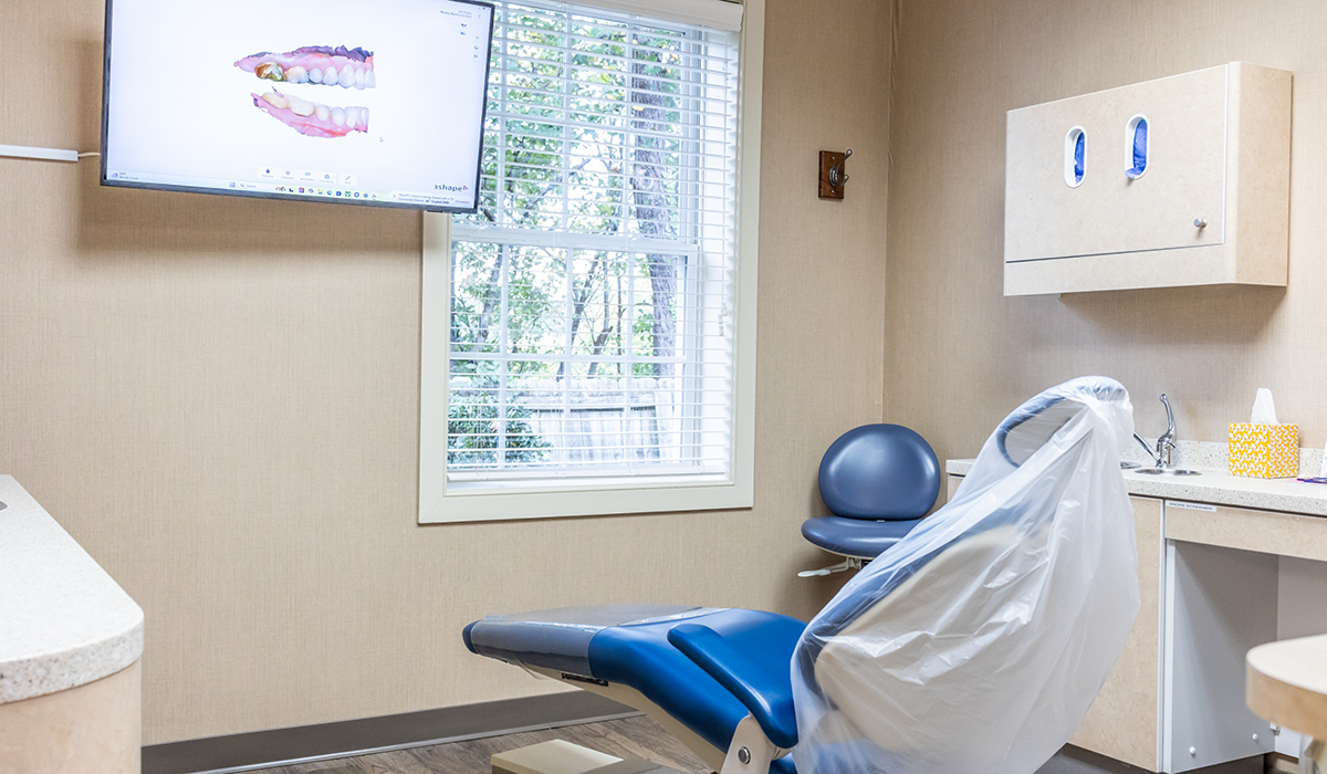 Dental exam chair next to a window