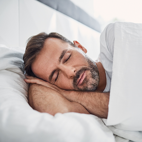 Man sleeping soundly on his side